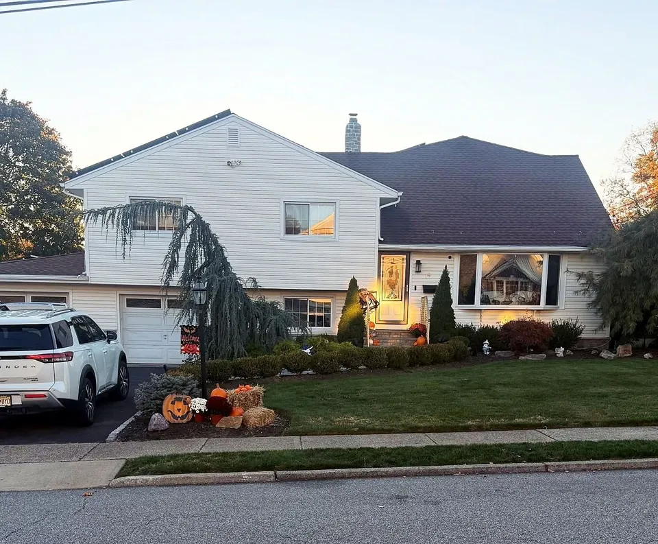 The same split level in daylight, the roofline strip is not visible