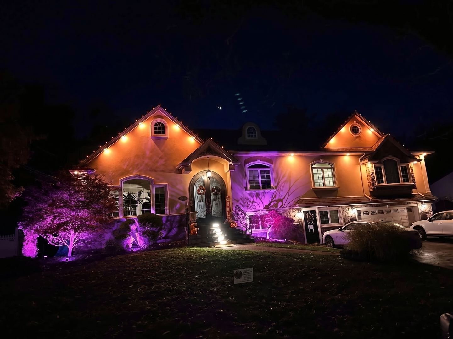 The same house in orange and purple for Halloween