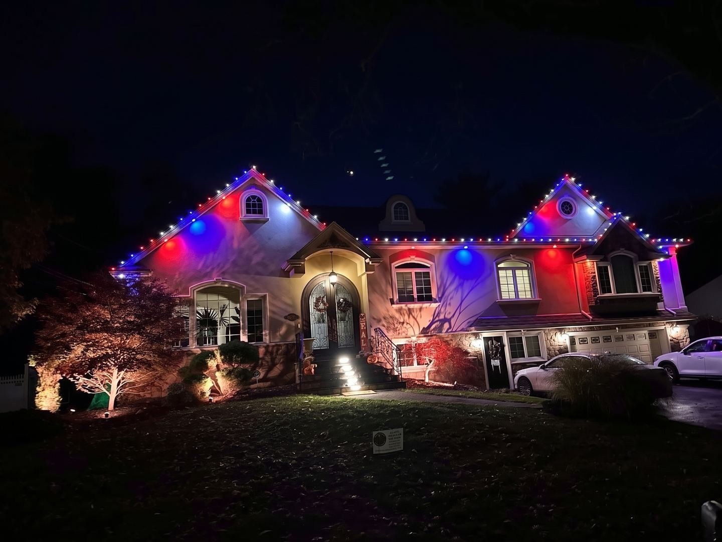 The same house in red, white and blue for the Fourth of July